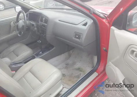 1999 Infiniti G20 Standard/Touring из США, поврежденный, VIN JNKCP11A5XT011959